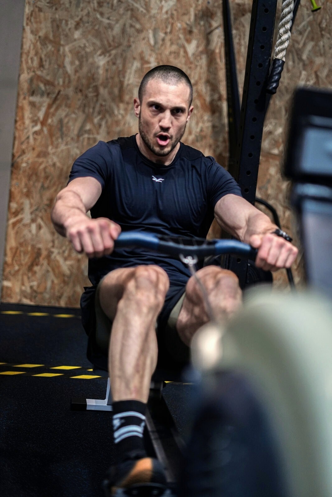 Rameur en compétition Fitness Revo